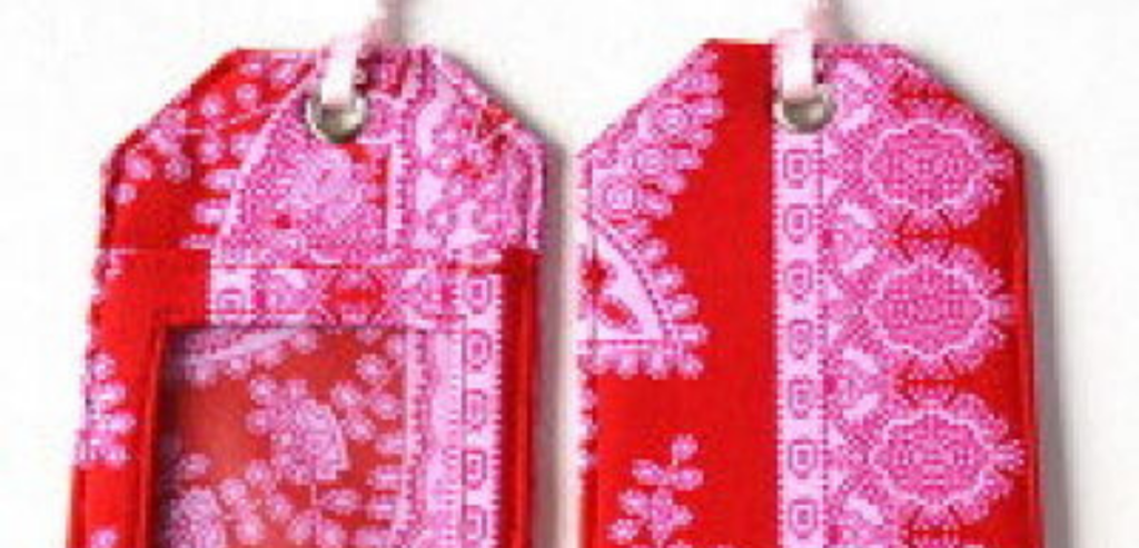 2 pink luggage tags