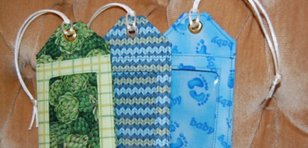 Blue and green luggage tags