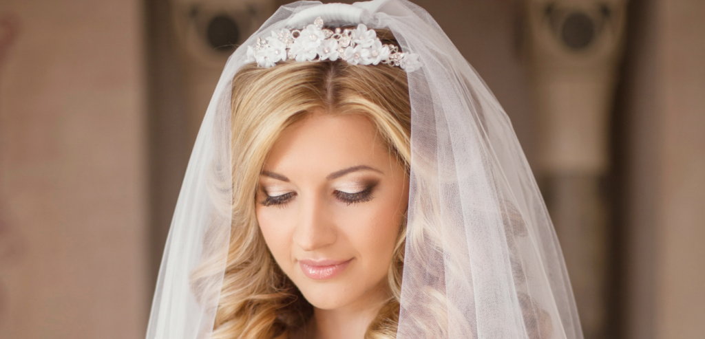 A lovely tulle bridal veil adds to the beauty of any bride