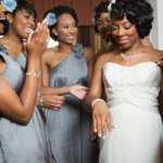 A beautiful bride and her bridesmaids celebrate her dream weddding all done on a budget