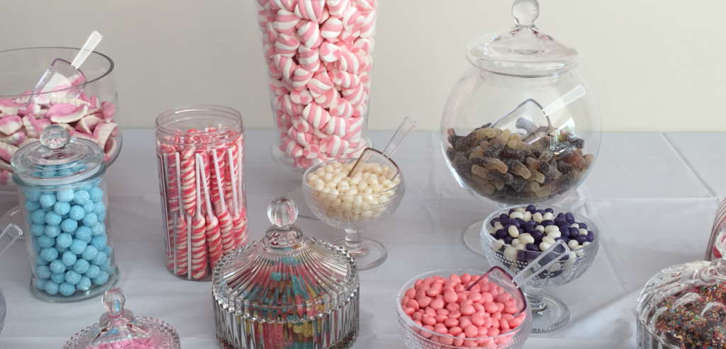 A colorful candy buffet is a great addition to a wedding