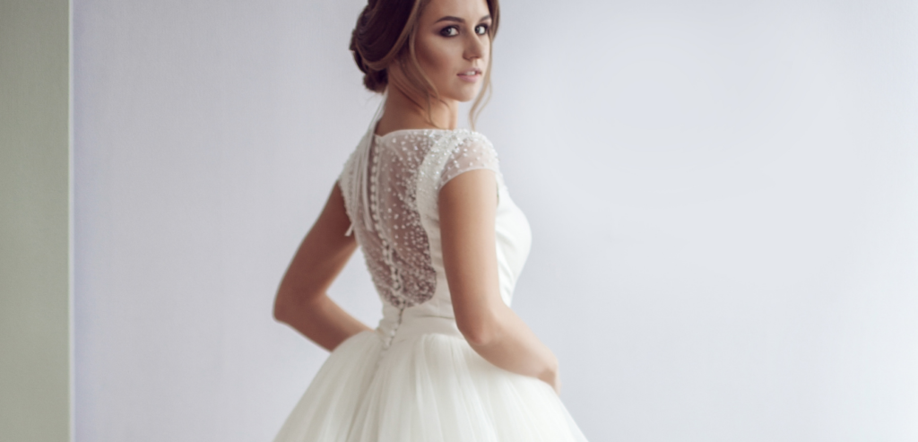 Cap sleeve lace top ball gown wedding dress