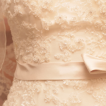 A sheath wedding dress with a well defined waistline