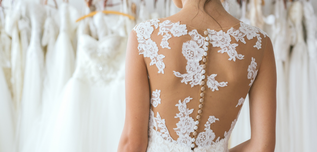 A lace applique top adds elegance to a wedding gown