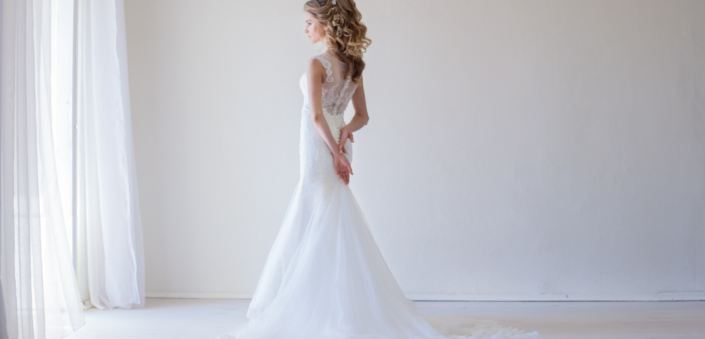 A simple, elegant, sleeveless, lace wedding dress